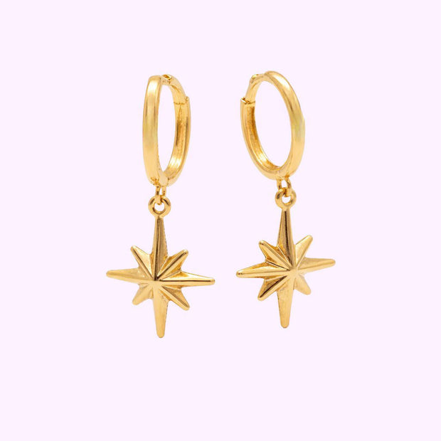 Aretes Huggies con Estrella de 8 Picos Oro Turco 10K